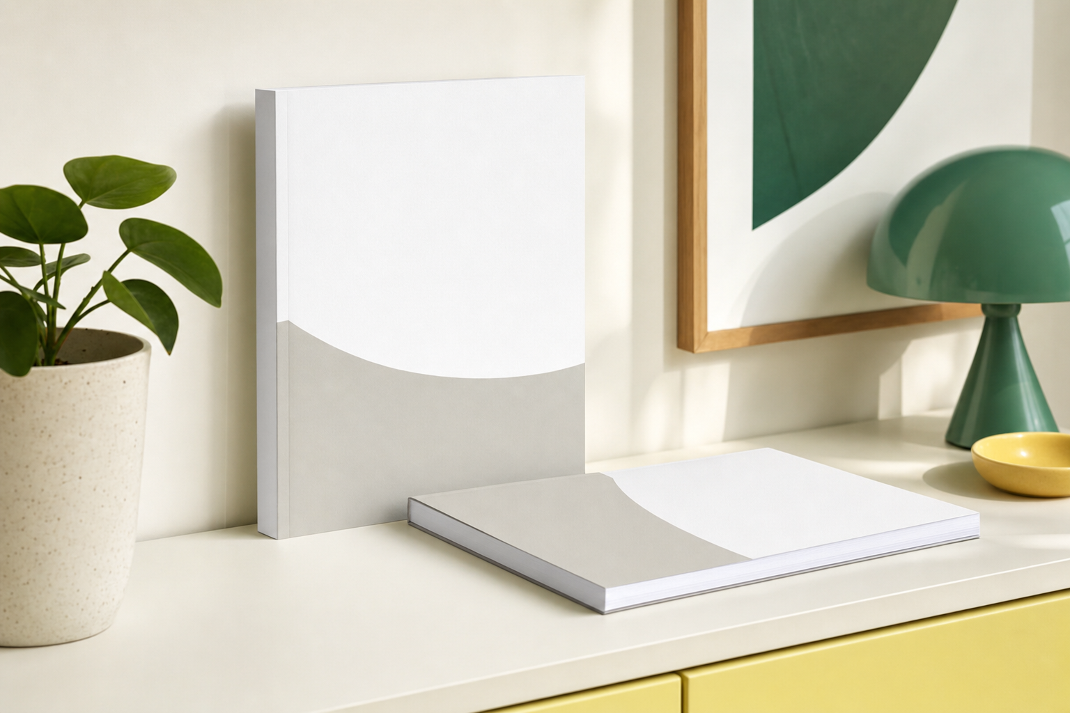 Perfect bound booklet with a square glued spine standing on a bright studio shelf